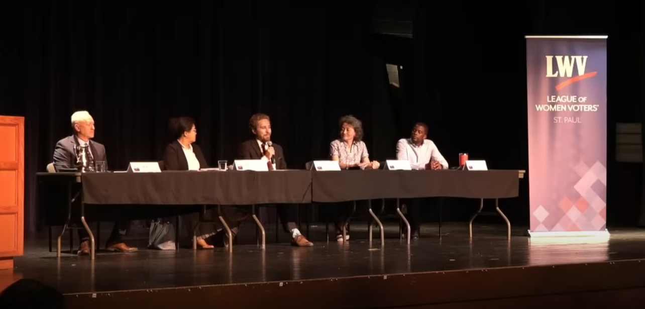 The five Mayoral Candidates sitting on the stage.