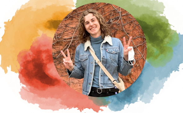 In a circular pattern we have the SPNN colors gold, red, green, and blue swirled next two each other. On top is a photo of Tess. 