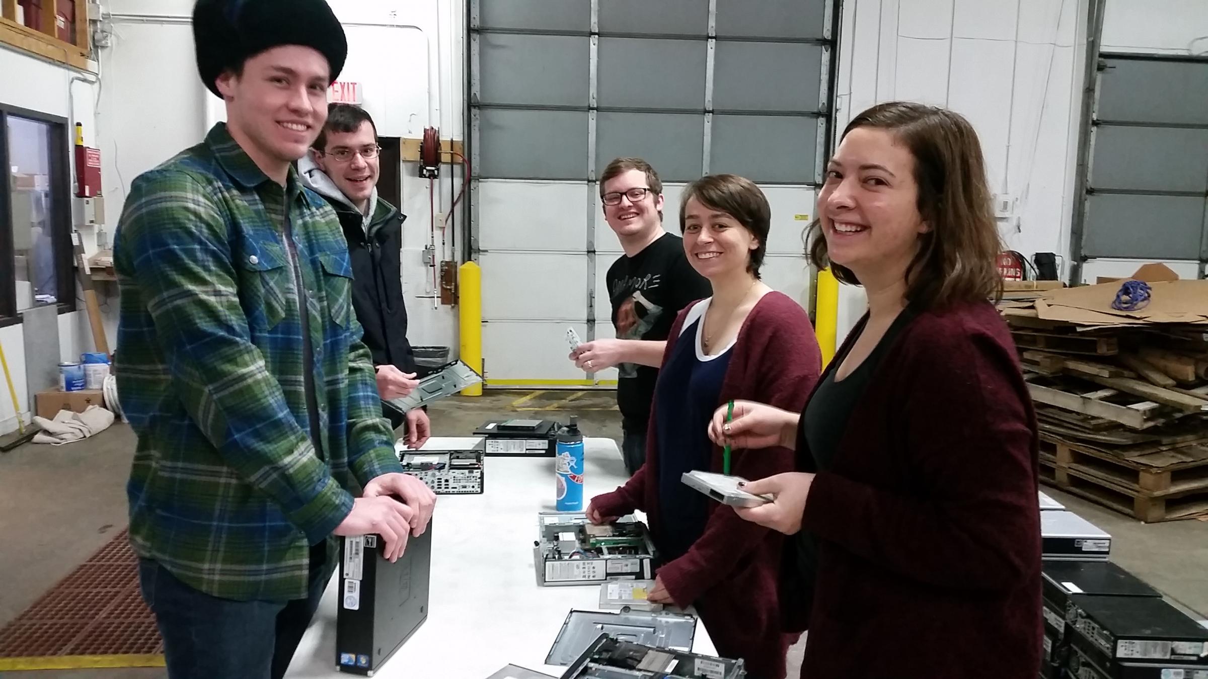 Group photo with their computers